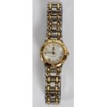 LADY CONCORD "SARATOGA" 18KT YELLOW GOLD AND  STAINLESS STEEL WRISTWATCH:  Having an 18kt  yellow