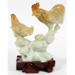 CHINESE HARDSTONE CARVING, H 5", W 8 1/2":   Carved as two chickens and a flower, on a carved