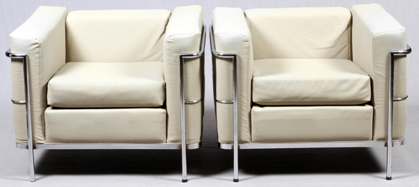 AFTER LE CORBUSIER LOUNGE CHAIRS, PAIR, H 28":   In the LC-2 style, each is upholstered in