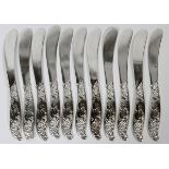 AMERICAN STERLING BUTTER SPREADERS, C. 1900,  ELEVEN, L 5 1/2":  Each is engraved with a  script C