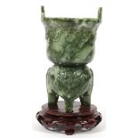 CHINESE CARVED SERPENTINE KORO, H 8", DIA 4":   On three legs. Hand carved from a single piece  of