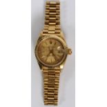 LADY ROLEX OYSTER PERPETUAL DATEJUST 18KT YELLOW  GOLD WRISTWATCH:  Having a 18kt yellow gold