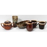 BROWN GLAZED POTTERY CUP, CREAMER, SUGAR, ETC.,  7 PCS.:  One creamer; one sugar; two coffee