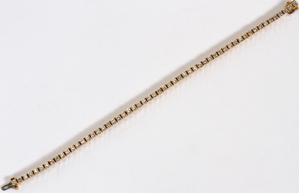 14KT YELLOW GOLD & 56 DIAMONDS TENNIS BRACELET,  L 6 3/4":  A 14kt yellow gold and 56 diamonds