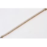 14KT YELLOW GOLD & 56 DIAMONDS TENNIS BRACELET,  L 6 3/4":  A 14kt yellow gold and 56 diamonds