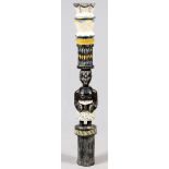 AFRICAN WOODEN TOTEM, H 64 1/2":  A female form  holding a book.  Having painted green, blue, and