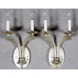 TWO-LIGHT SILVER PLATE SCONCES, FOUR:   Electrified.  Having urn form bottoms supporting  two arms