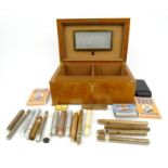 Dunhill walnut veneer cigar humidor box with a selection of cigars including unopened packets of