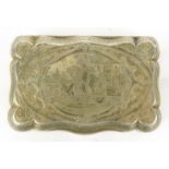 Continental unmarked silver snuff box with floral chased decoration and a view of a figure on