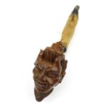 Continental carved wooden pipe of a devil with a hoof stem, 29cm long : FOR CONDITION REPORTS AND TO