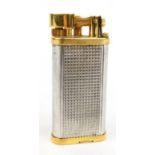 Dunhill Unique pocket lighter, numbered 101070 : FOR CONDITION REPORTS AND TO BID LIVE VISIT WWW.