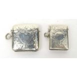 Two silver vestas with floral chased decoration, both Birmingham hallmarked, the larger 4cm in