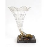 Victorian glass and brass rams head cornucopia vase on a black variegated marble stand, 25cm