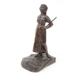 Bronze figure of a Dutch peasant girl, 18cm high : FOR CONDITION REPORTS AND TO BID LIVE VISIT WWW.