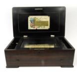 Mahogany cased Swiss musical box playing on ten aires, the top inlaid with a picture of a cove and