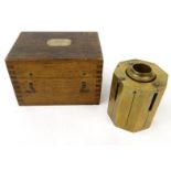 Surveyor's octagonal brass level, housed in a wooden box with Mahier Optician label, 8cm high :