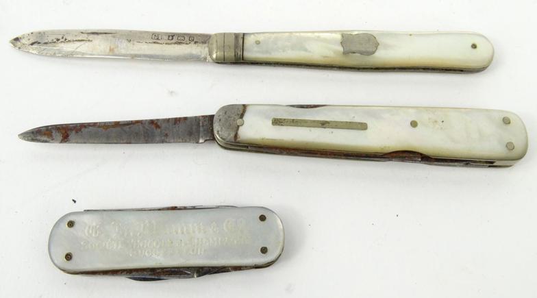 Selection of penknives and fruit knives including a silver bladed example and an advertising example