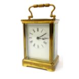 Brass carriage clock with bevelled glass panels, R. & Co, Made in Paris, 11cm high excluding