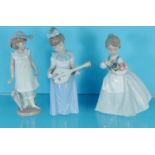 Two boxed Lladro China figures and a boxed Nao figure : For Condition Reports please visit www.