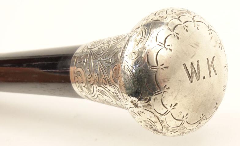 Ebonised wooden walking cane with silver handle and floral chased decoration, TWG London 1925-26, - Image 2 of 3