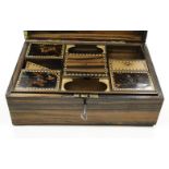 Rectangular Coromandel workbox, the sub divided interior with tortoiseshell and inlaid wooden lidded