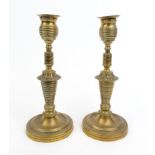 Pair of Victorian brass candlesticks with engine turned design stems, 21cm high : For Condition