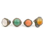 Four oriental Chinese silver rings set with polished stone and enamel decoration : For Condition