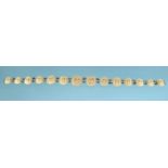 Oriental Chinese carved ivory necklace, the largest panel 3cm high, the necklace 38cm long : For