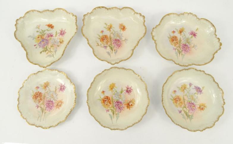 Six hand painted Limoges china dishes, the largest 26cm long : For Condition Reports please visit
