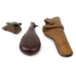 Victorian brass and leather powder flask, 'Hunter' leather gun holster and a miniature model of a