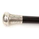 Ebonised wooden walking cane with silver handle and floral chased decoration, TWG London 1925-26,