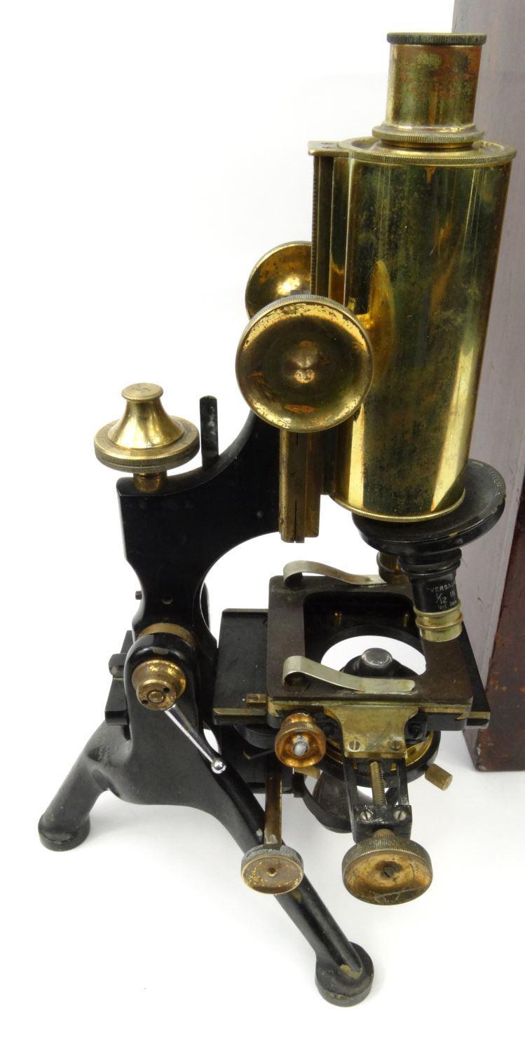 W. Watson & Sons microscope housed in a lockable wooden case,, 313 High Street, London. 34cm