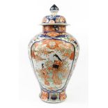 Large 19th century oriental Japanese Imari patterned baluster jar and cover decorated with geisha