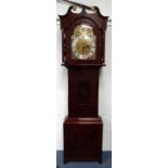 Mahogany grandfather clock with brass faced silvered dial for Wm. LL Wilkinson Leeds, the movement