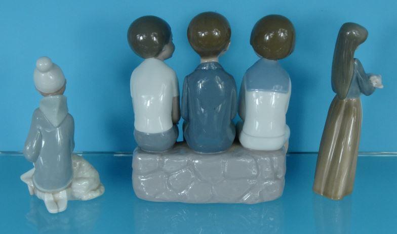 Three boxed Lladro China figures - one of three young figures seated, a girl with a pig and a boy - Image 2 of 4