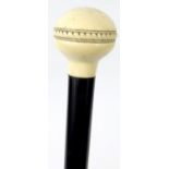 Ivory topped walking cane with carved band design, 94cm long : For Condition Reports please visit