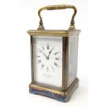 Brass carriage clock, the enamel dial for J.W. Benson Ltd, 25 Old Bond Street, striking on a gong,