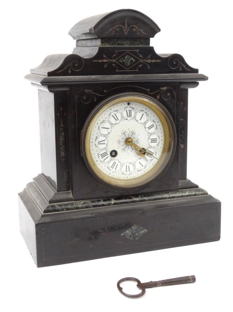 Victorian black slate mantel clock with white floral enamel dial, striking on a bell, 30cm high :