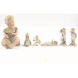 Large 19th century bisque piano baby, pair of Continental bisque figures of children and three
