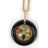 Oriental Chinese pendant set with semi precious stones in a 14ct gold mount on a gilt metal