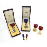 Six Flemish military medals and decorations in boxes, many with enamel decoration : For Condition