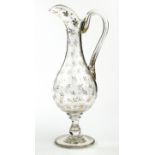 Victorian glass ewer of baluster form, gilded with leaves, 35cm high : For Condition Reports