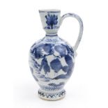 Oriental porcelain ewer painted in underglaze blue with figures and foliage, 21cm high : For