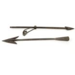 Two 19th century whaling harpoon tips, the longest 67cm long : For Condition Reports please visit