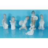 Four Lladro China figures and two Nao figures, the largest 18.5cm high : For Condition Reports