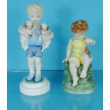 Two Royal Worcester china figures - Friday's Child Is Loving And Giving 3523 and a boy holding dogs,