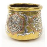 Middle Eastern brass and silver metal inlaid pot with Arabic design, 5cm high : For Condition