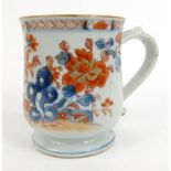 Oriental Chinese porcelain tankard, hand painted with flowers, 12cm high : For Condition Reports