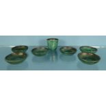 Six Gustavsberg Argenta green pottery wine coasters and a similar eggcup, 6cm diameter : For