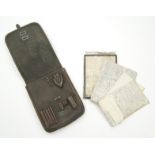 World War II German military Nazi leather map case containing a selection of maps : For Condition